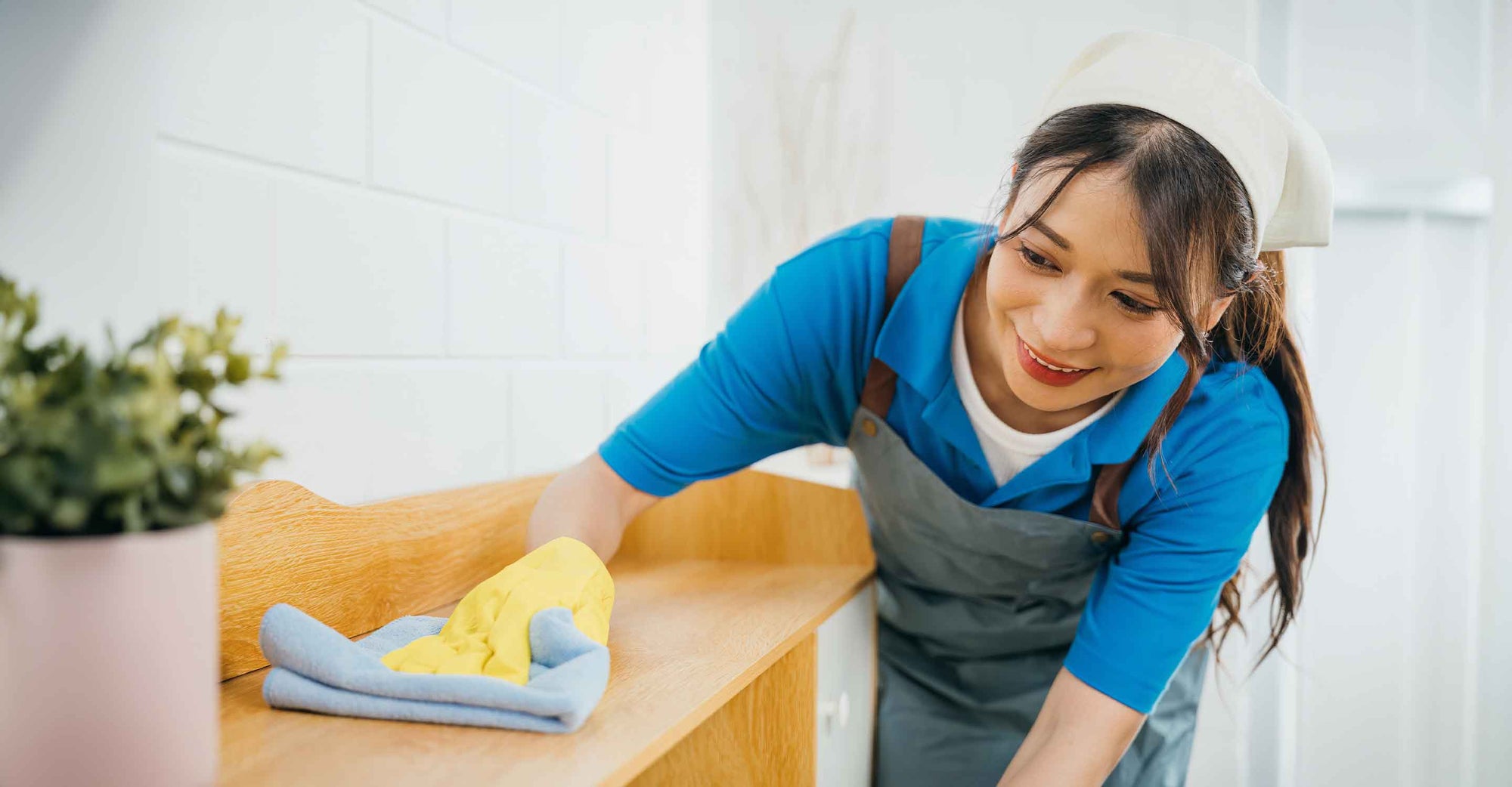 girl cleaning the dust from rack